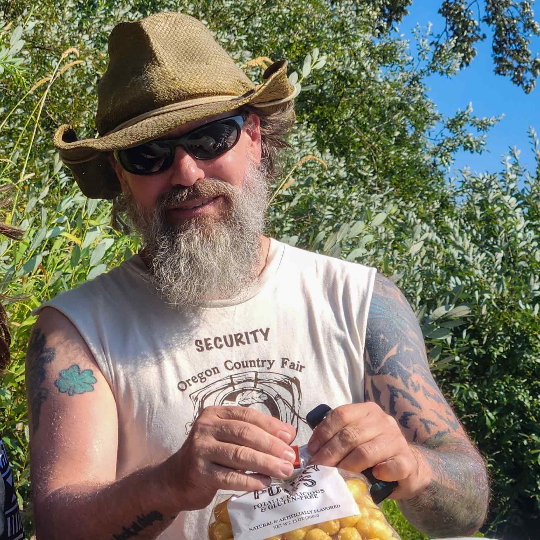 Pete. eating caramel corn on a recent rafting trip.